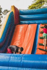 Water Slide Rental vs. Bounce House: Which Is Better for Your Party?
